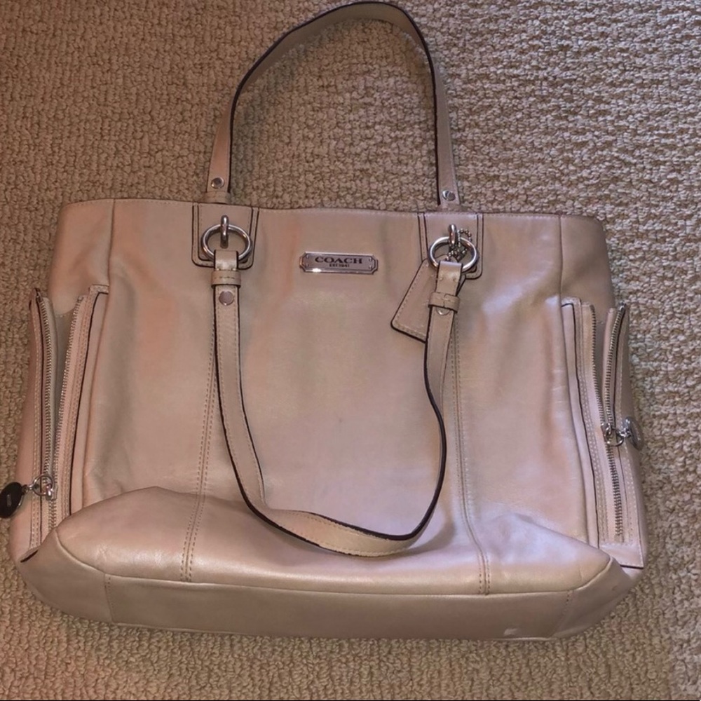 Cream with silver coach purse with leather material